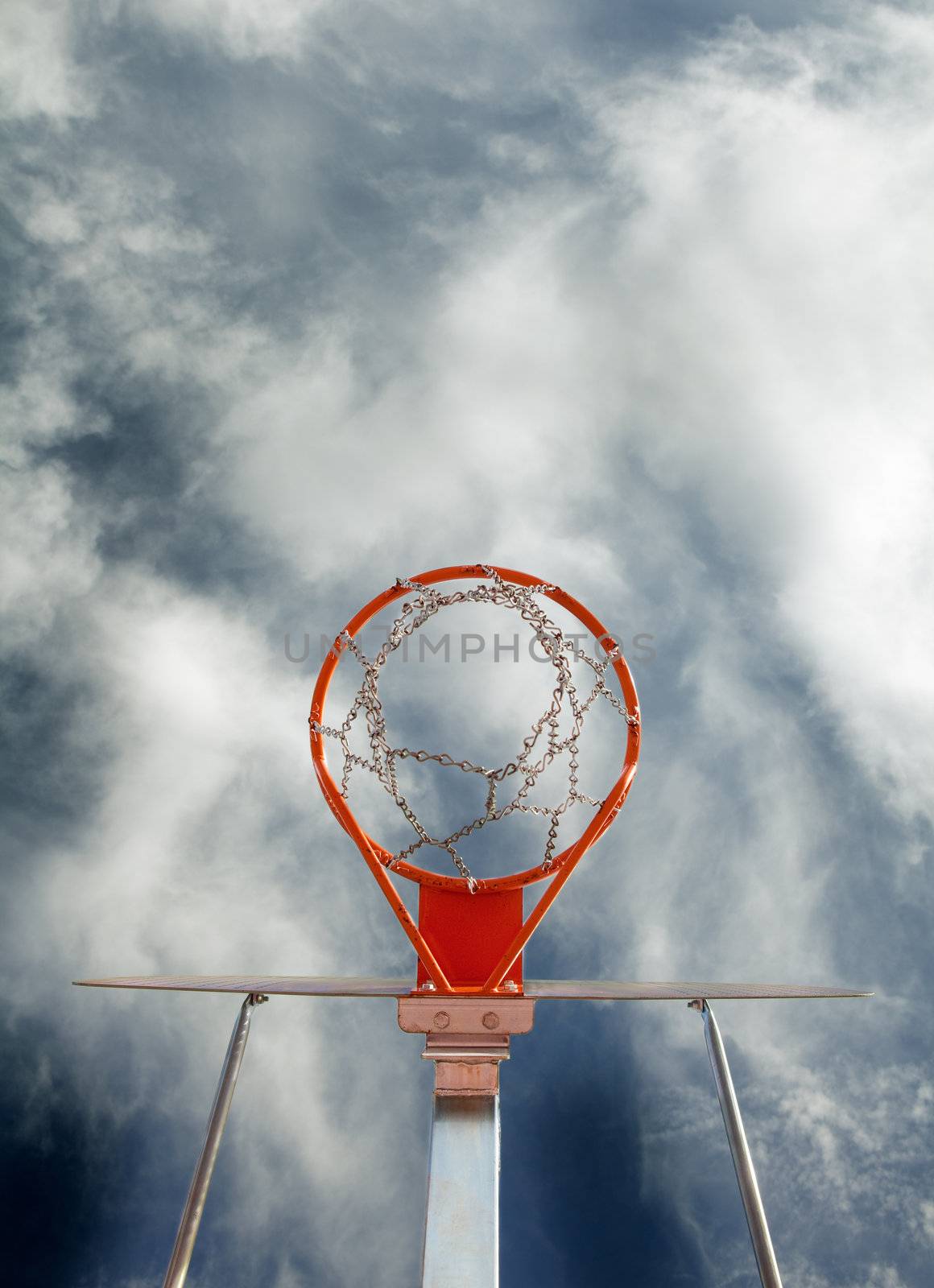 Abstract image of basketball goal against the sky