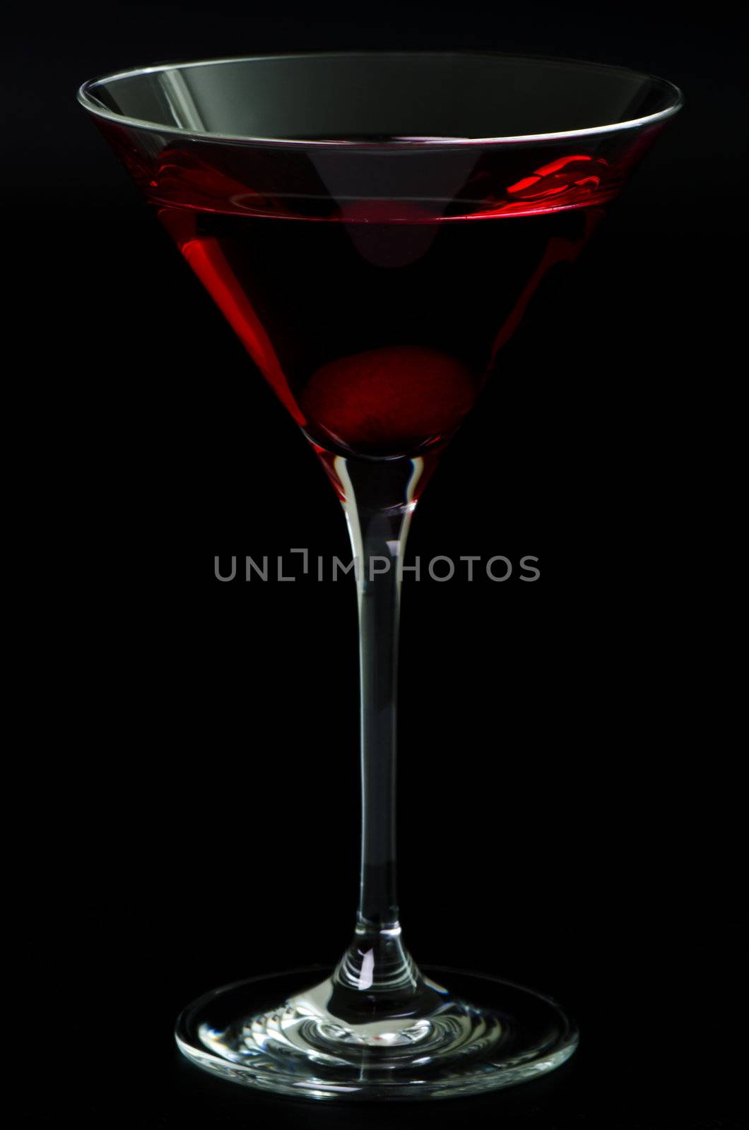 Glass with a red cocktail by Nanisimova