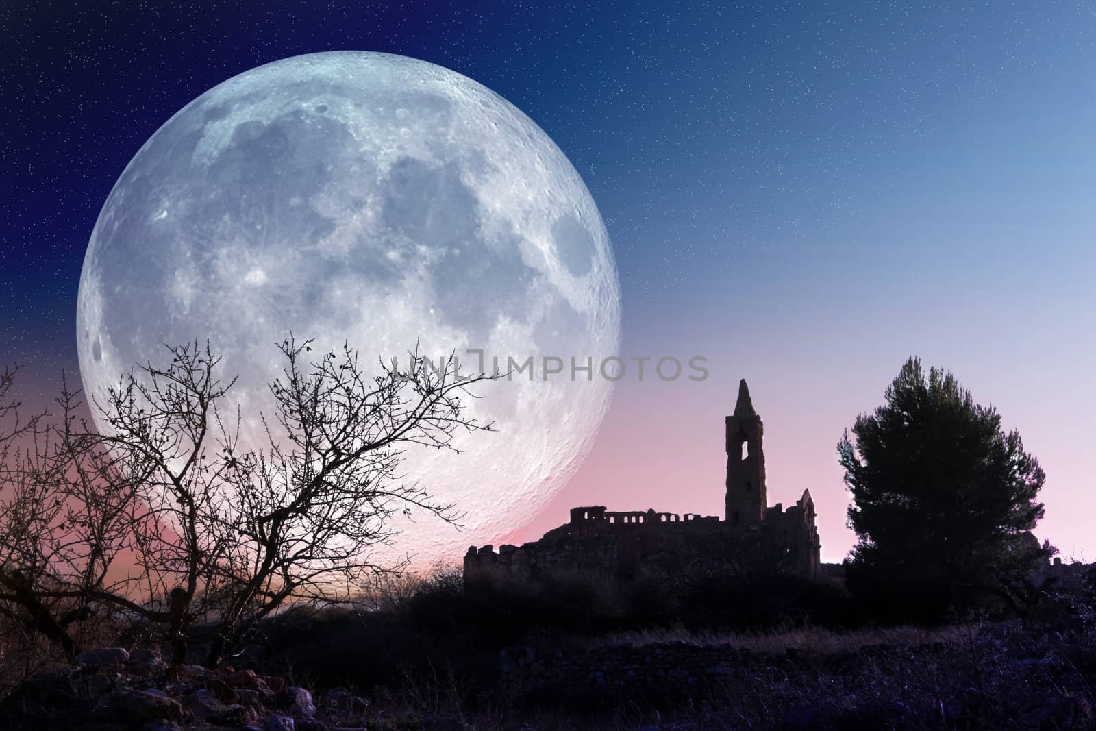 Mysterious landscape with full moon and church