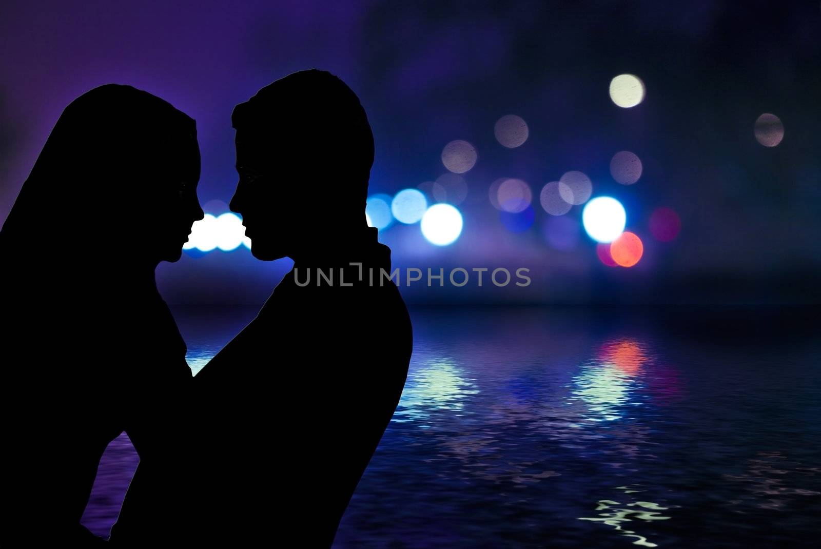 couple between the city lights