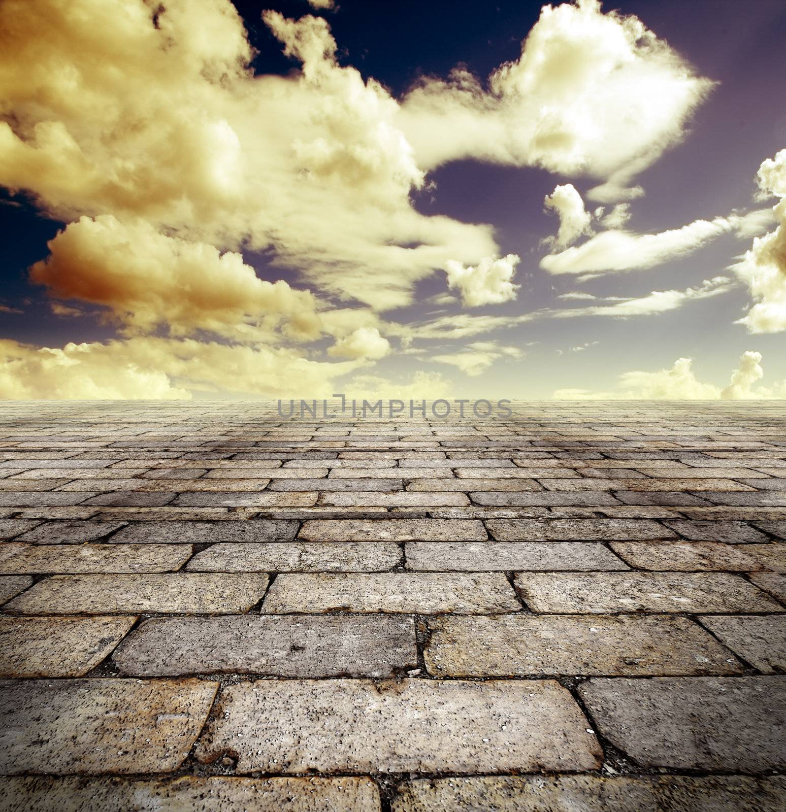Architectural background with cobbled streets and sky