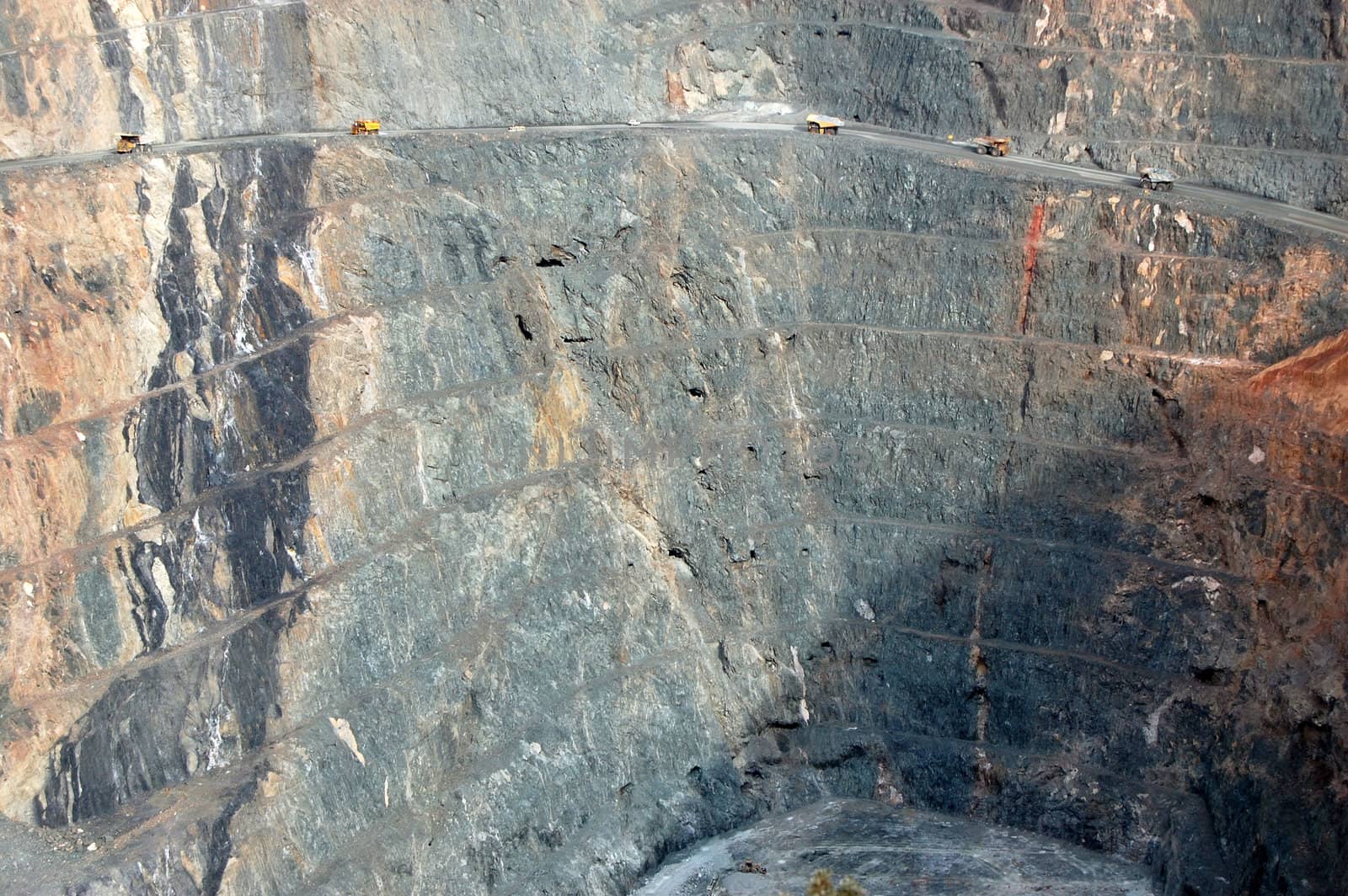 Trucks in Super Pit gold mine Australia by danemo