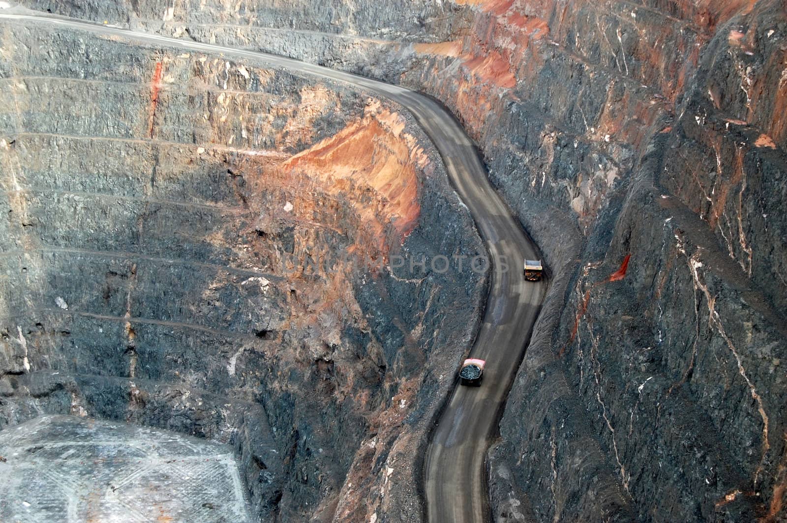 Trucks in Super Pit gold mine Australia by danemo