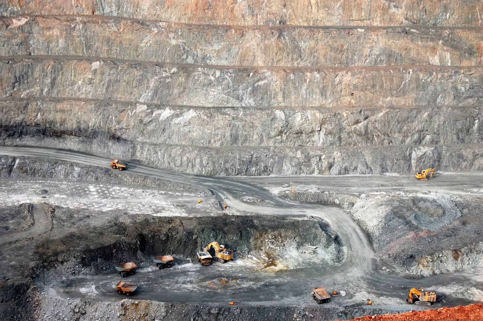 Trucks in Super Pit gold mine Australia by danemo