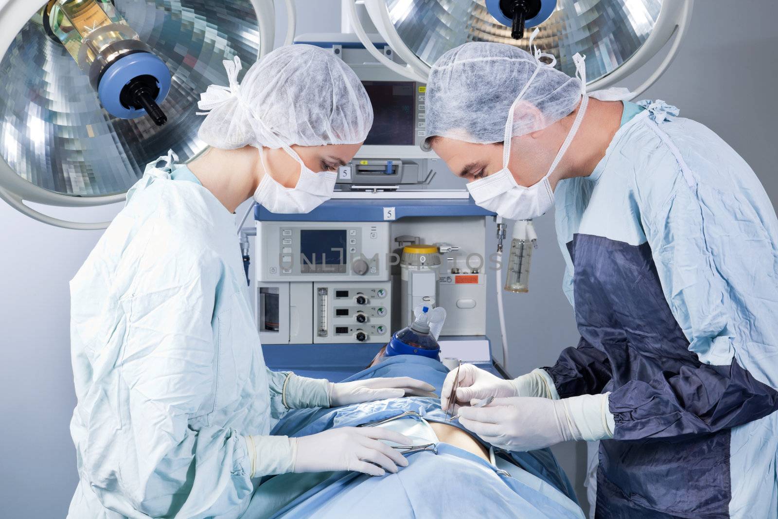 Medical professionals performing an operation by leaf