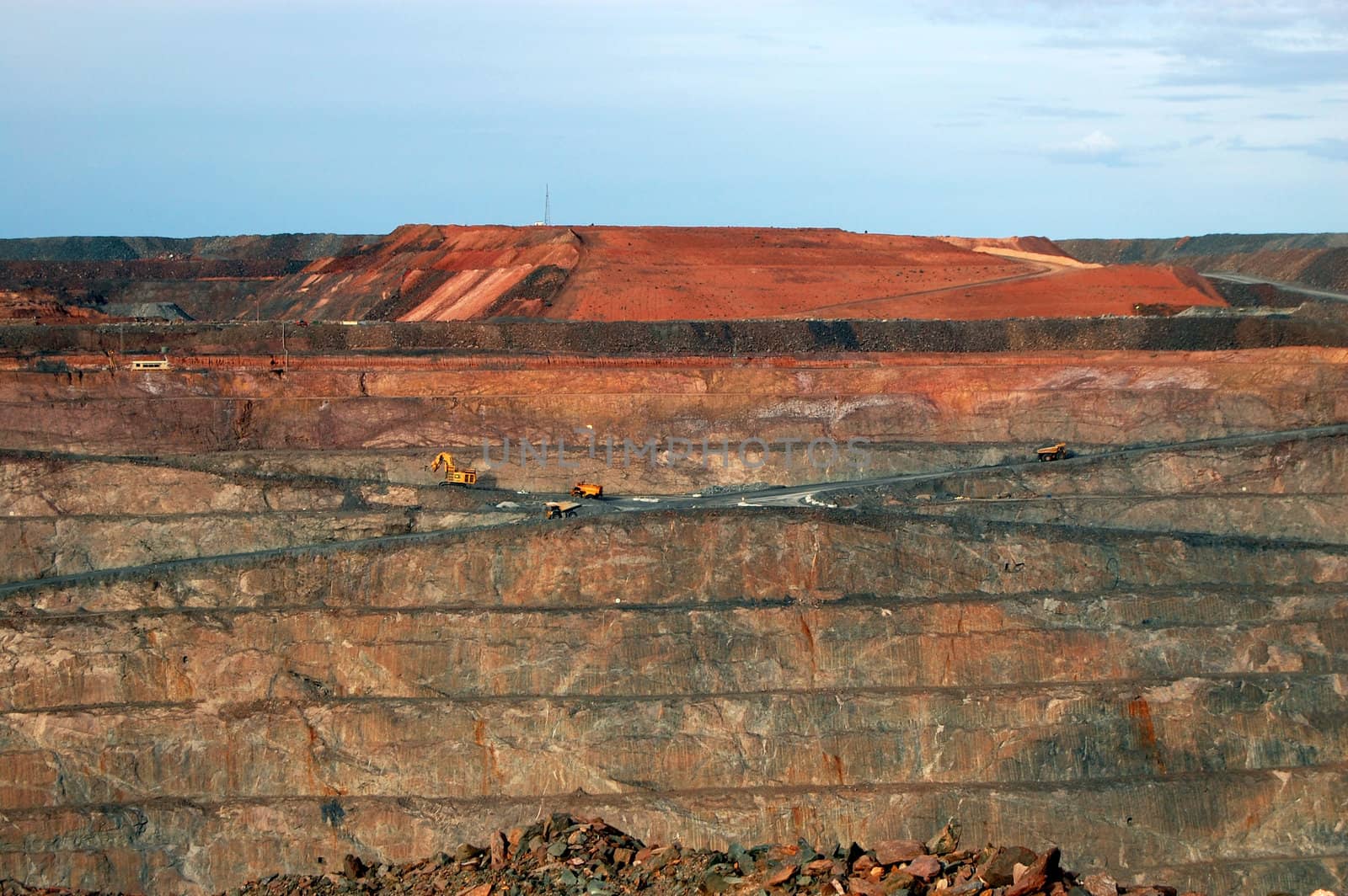 Trucks in Super Pit gold mine Australia by danemo