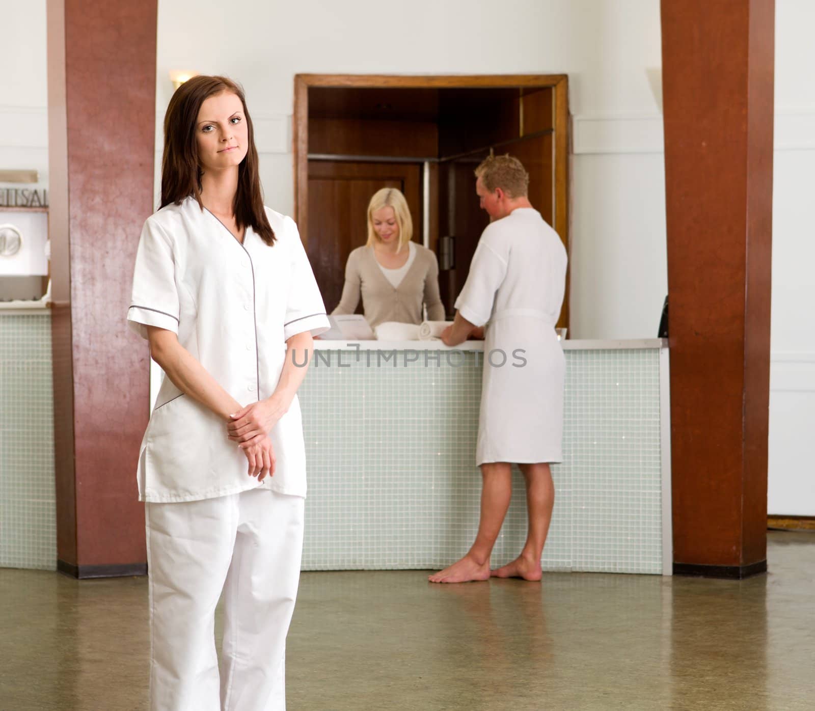 Portrait of a spa therapist worker standing in a recption
