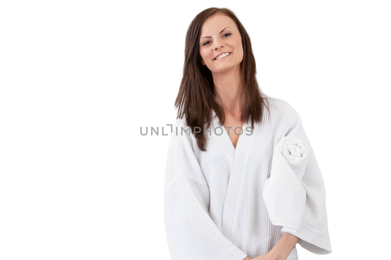 Pretty woman in a bathrobe by leaf