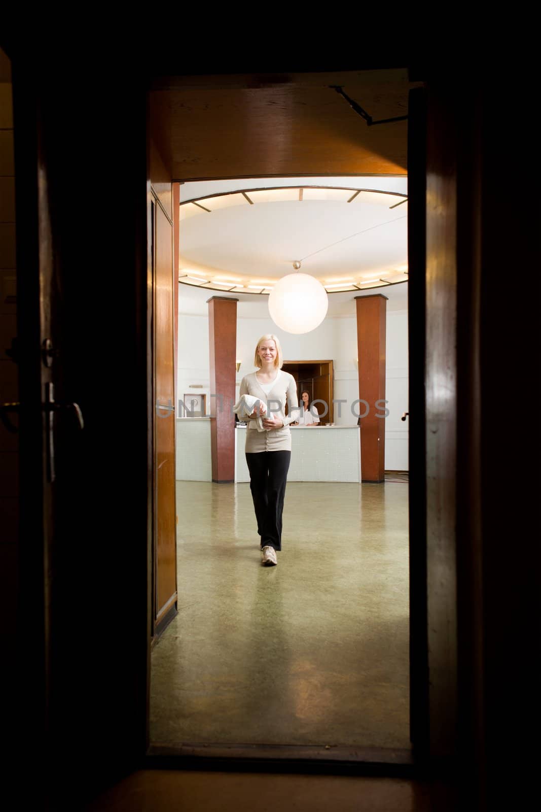 Woman in old Spa Interior by leaf