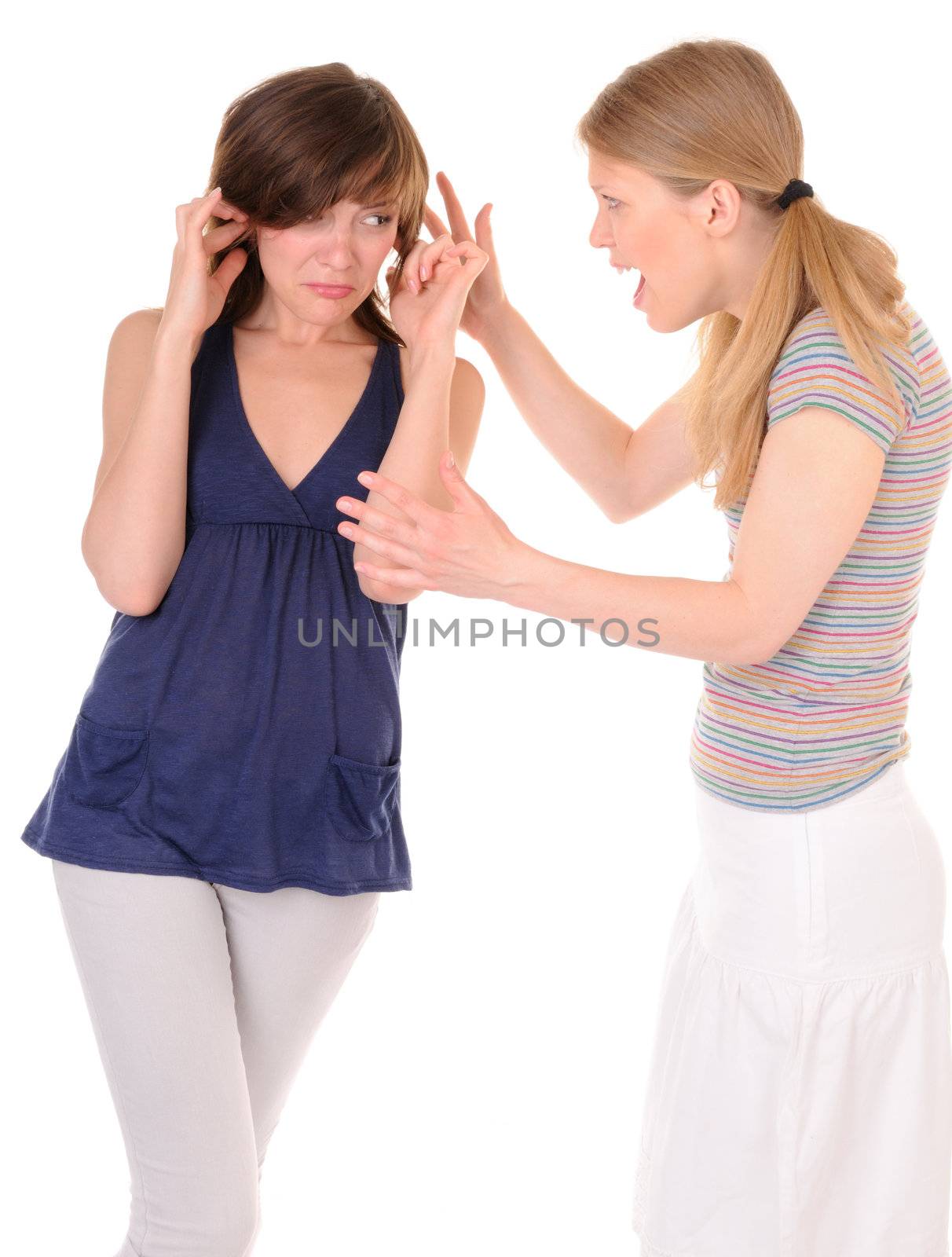 One young woman is shouting to another girl on white background