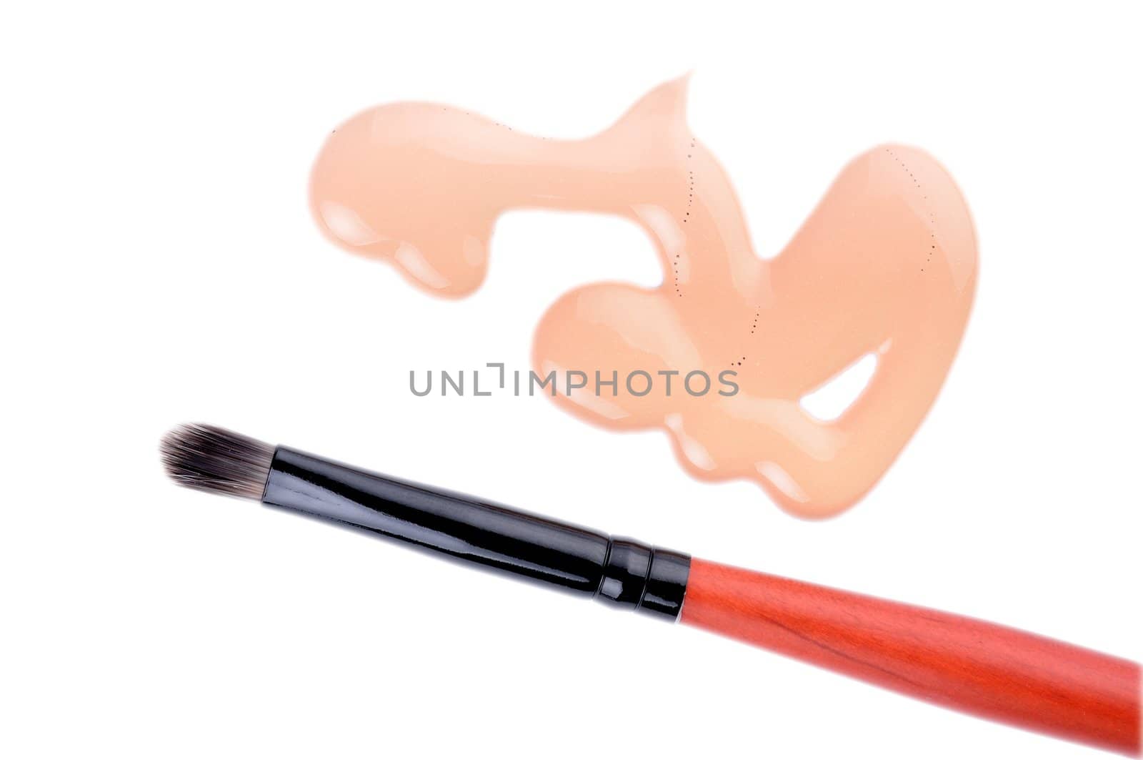 Professional malke-up brash and toner cream isolated on white background