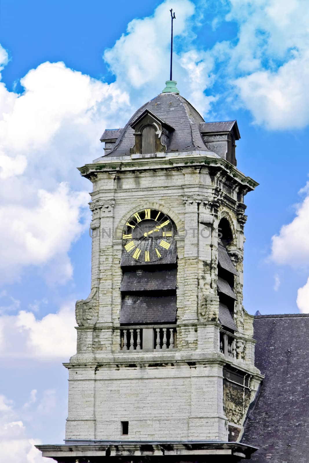 Clock tower on sky background