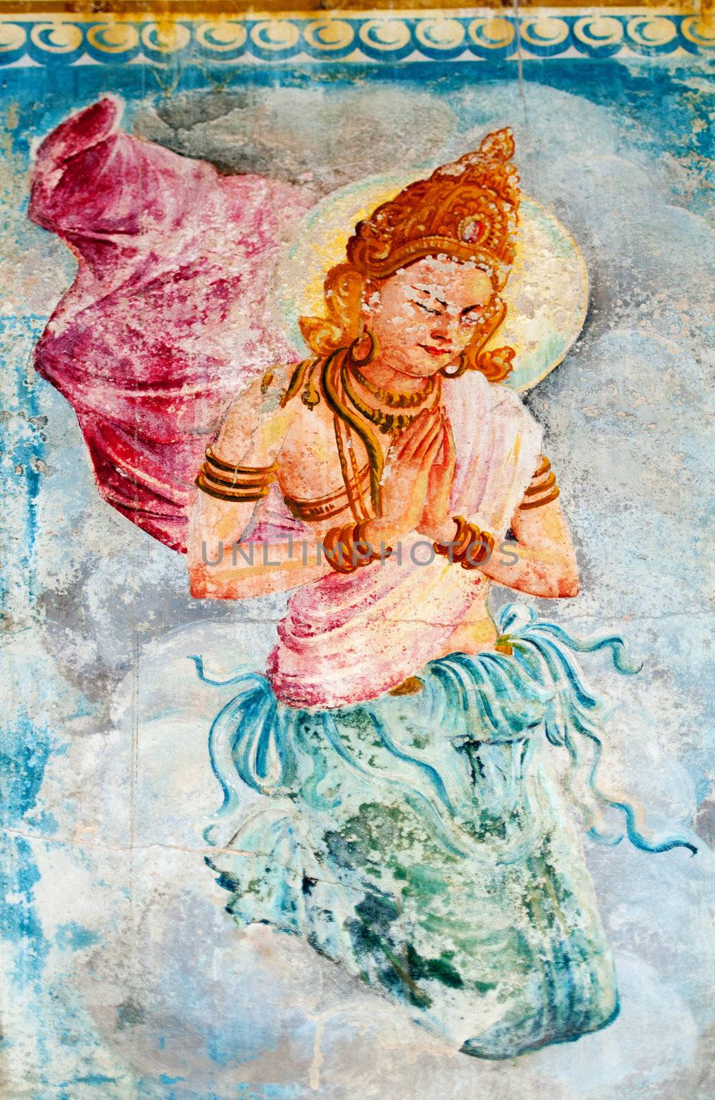 Traditional Sri Lanka style art with the buddhism angel - deva image on a wall