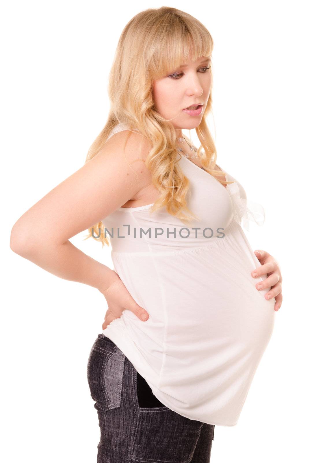 Pregnant woman feels discomfort in back, isolated on white background
