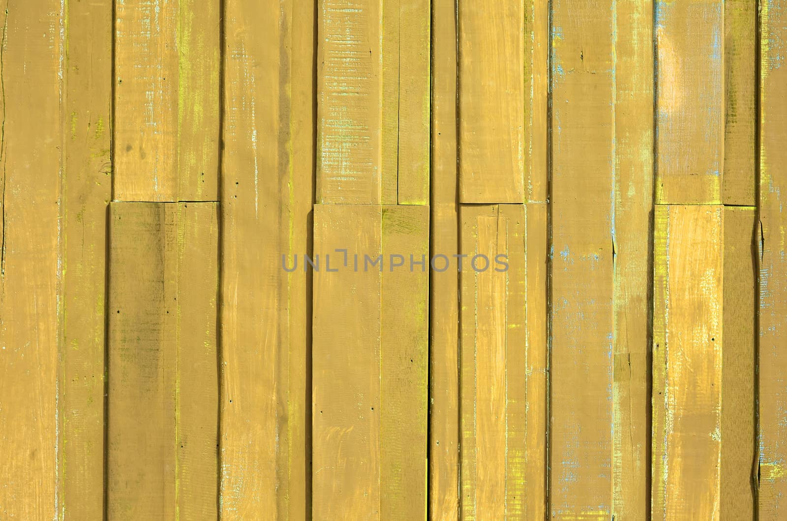 Texture of Yellow color paint plank wall for background