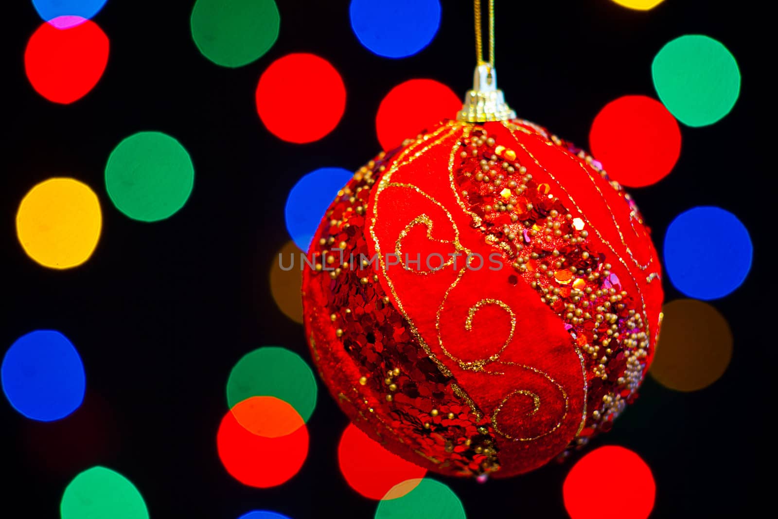 Red Christmas ball with lots of colors light