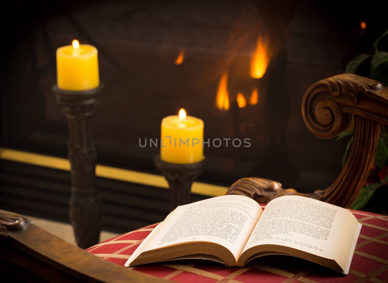 James Joyce 1917 book open on chair in chilly scene with fire and candles in background