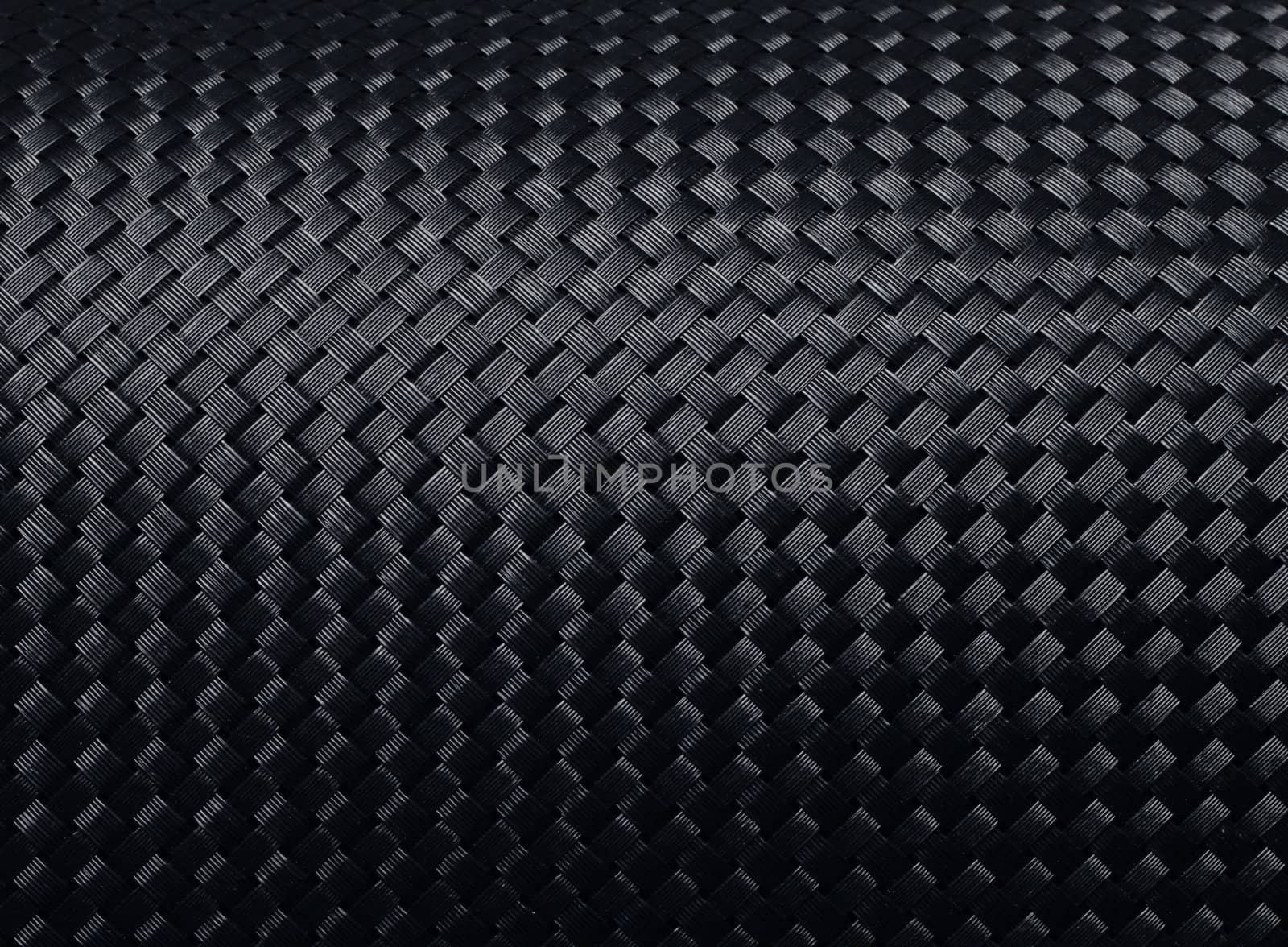 Black woven carbon fibre texture pattern background