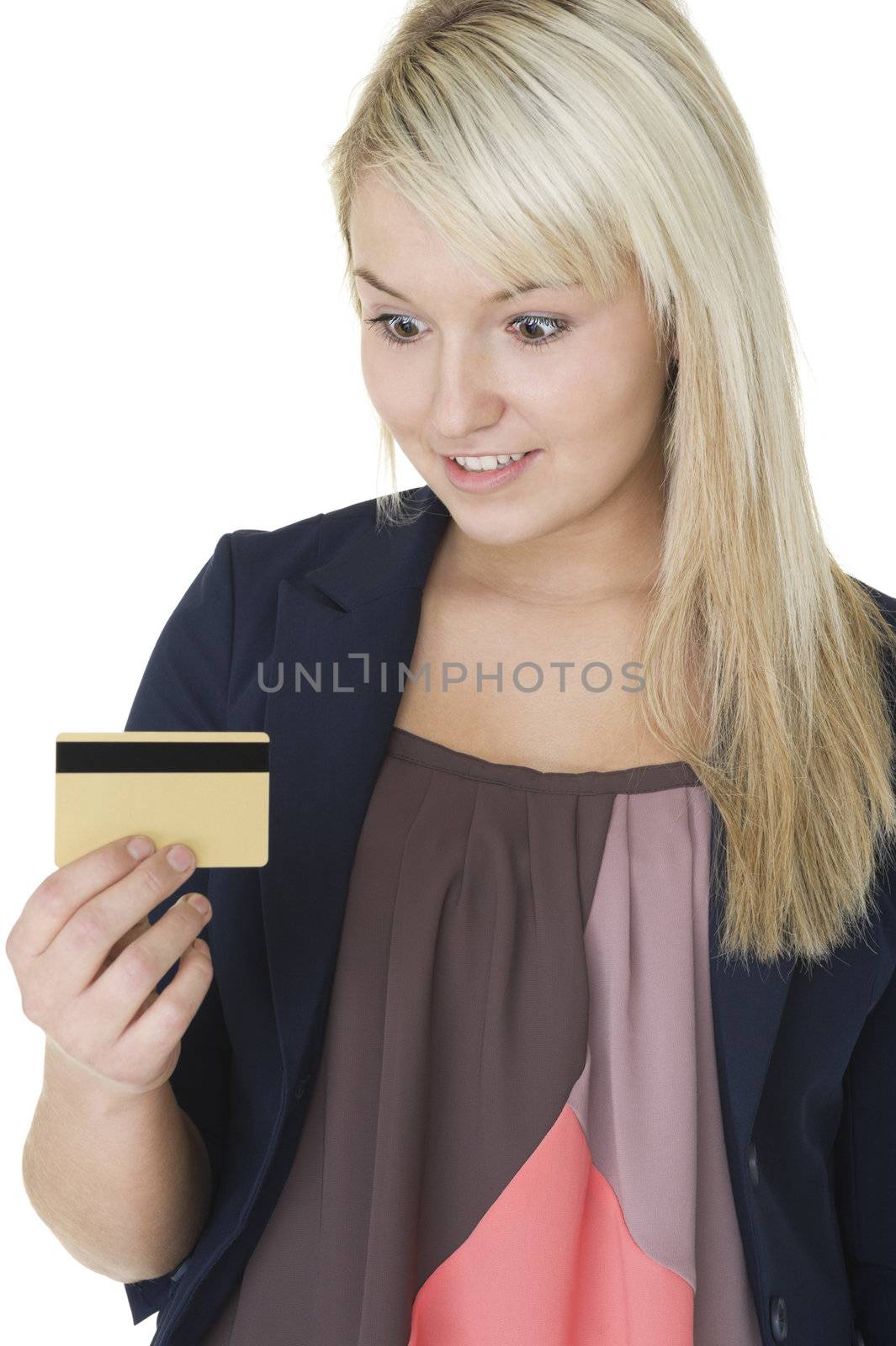 Woman looking at her credit card by MOELLERTHOMSEN