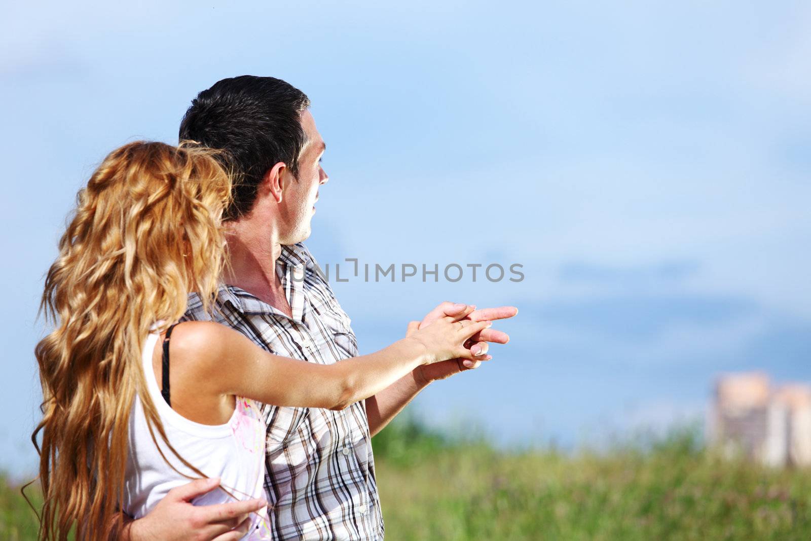 man and woman see houses and new flat