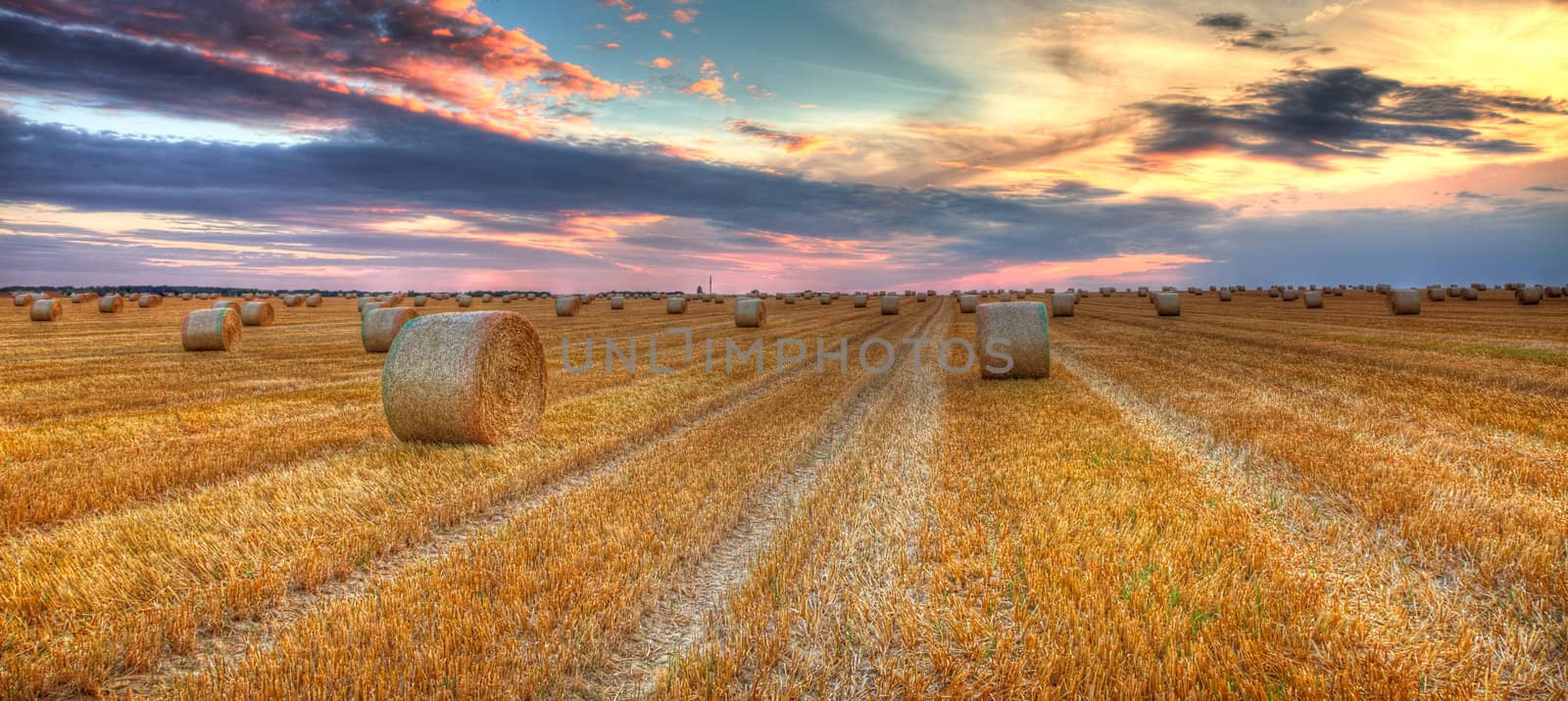 Sunset over the field by RazvanPhotography