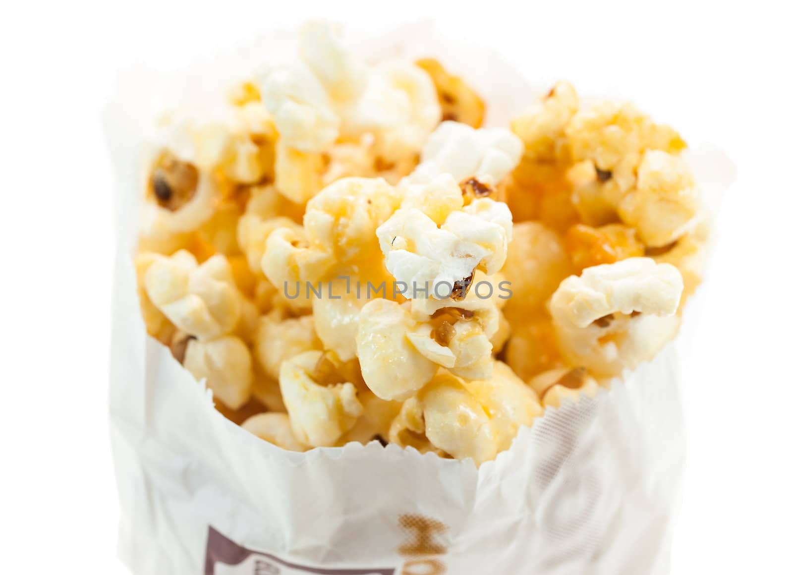 Popcorn in bag on white background by moggara12