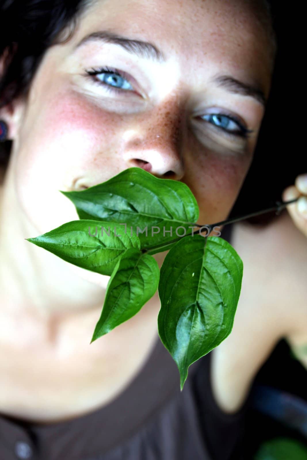 young woman with green foliage by Teka77