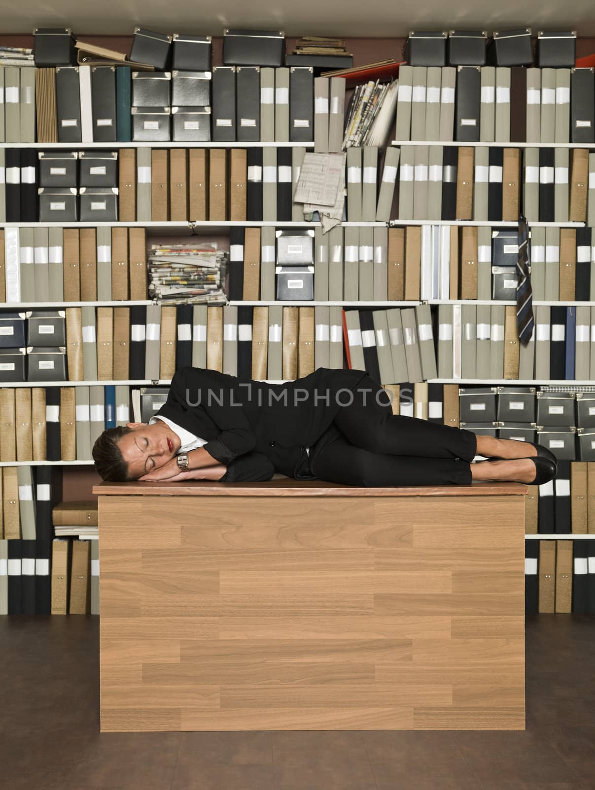 Businesswoman sleeping on the the table