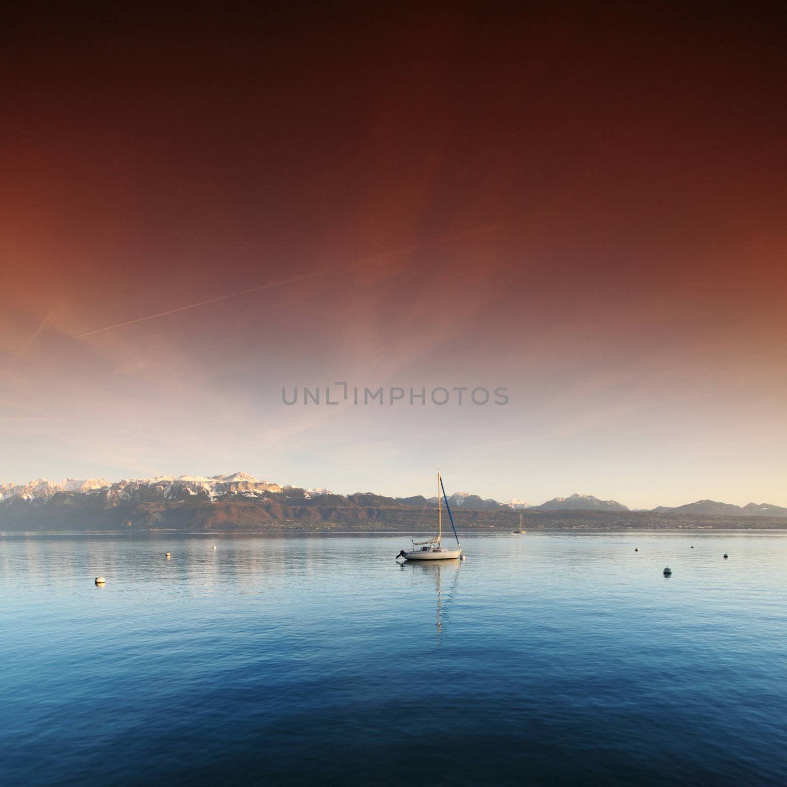 yacht in lake of geneva landscape on sunrise