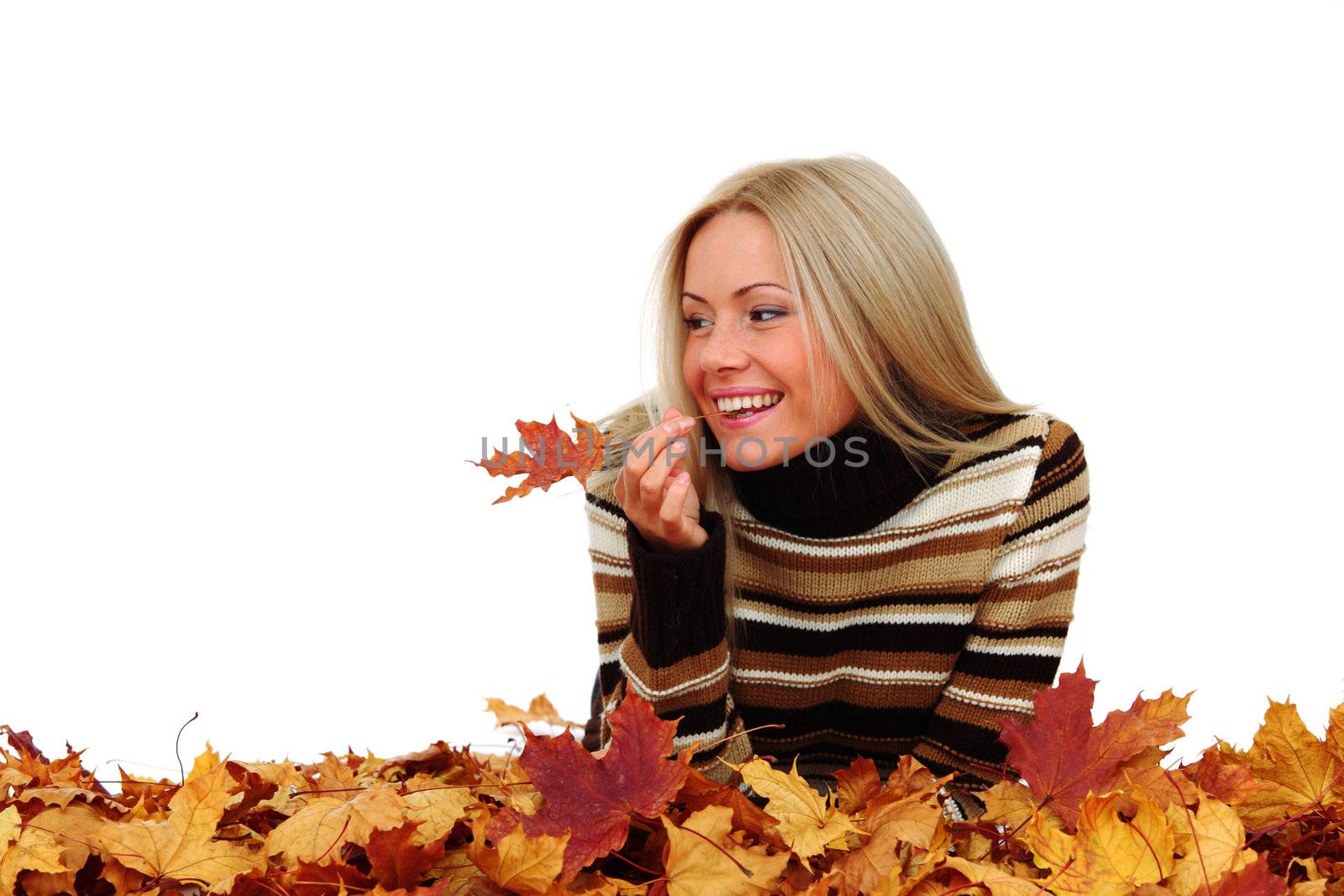  studio portrait of autumn woman in  yellow leaves