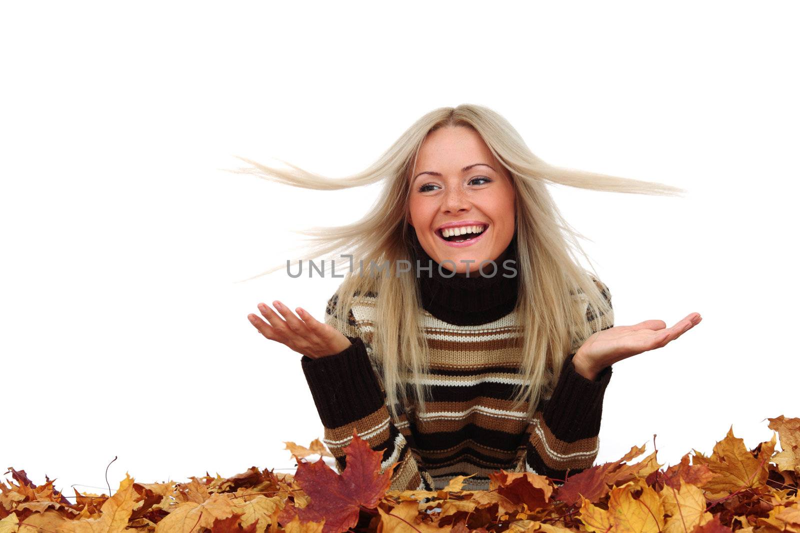  studio portrait of autumn woman in  yellow leaves