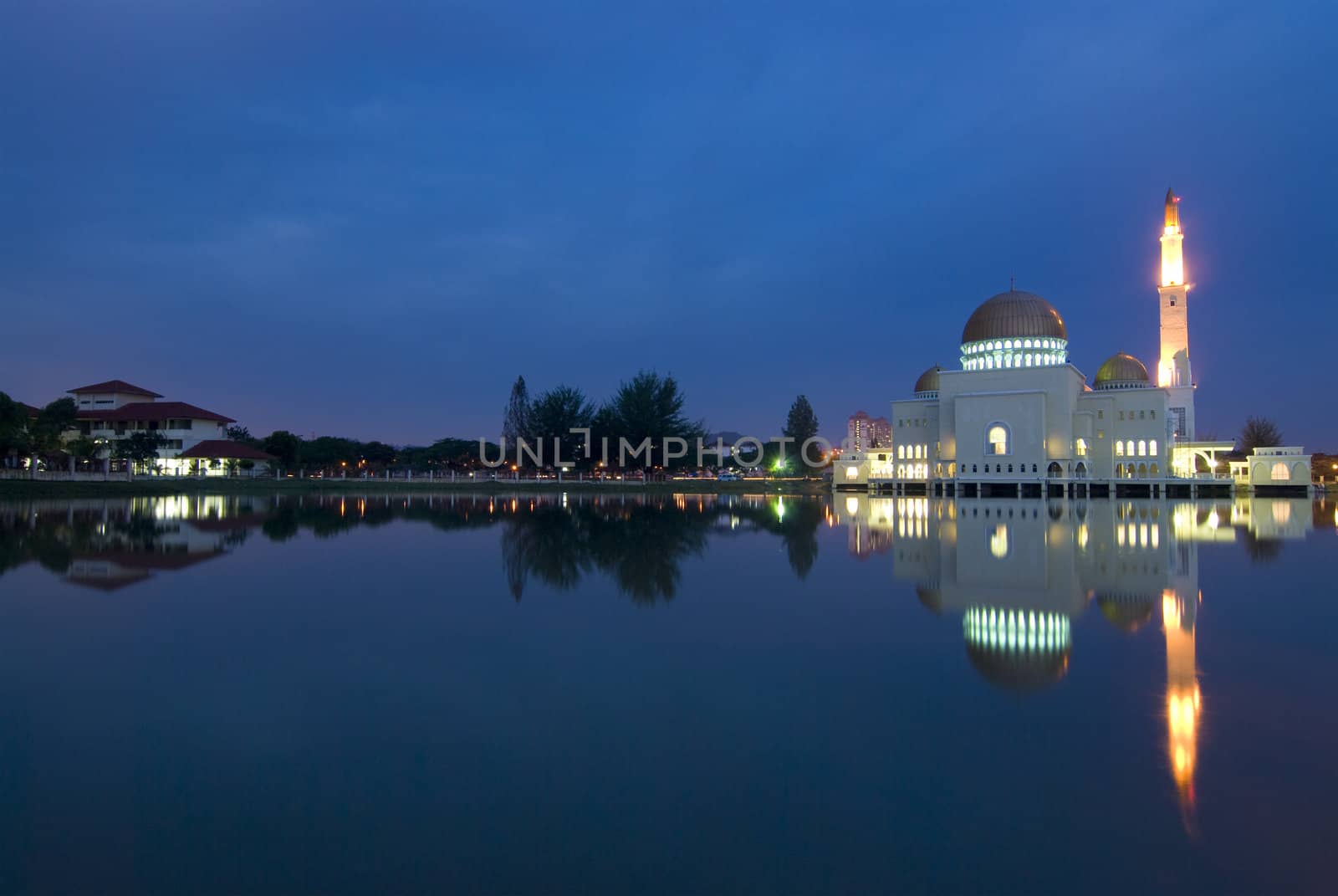 mosque with reflection on a lake
