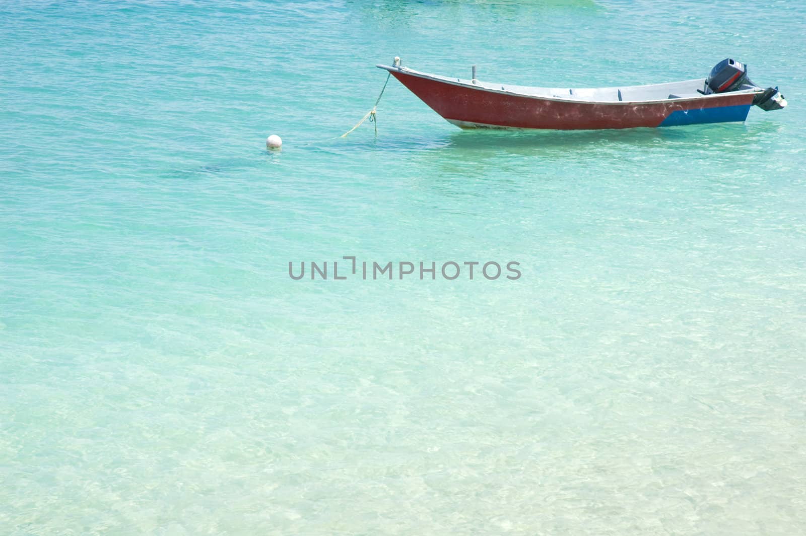 blue beach with boat