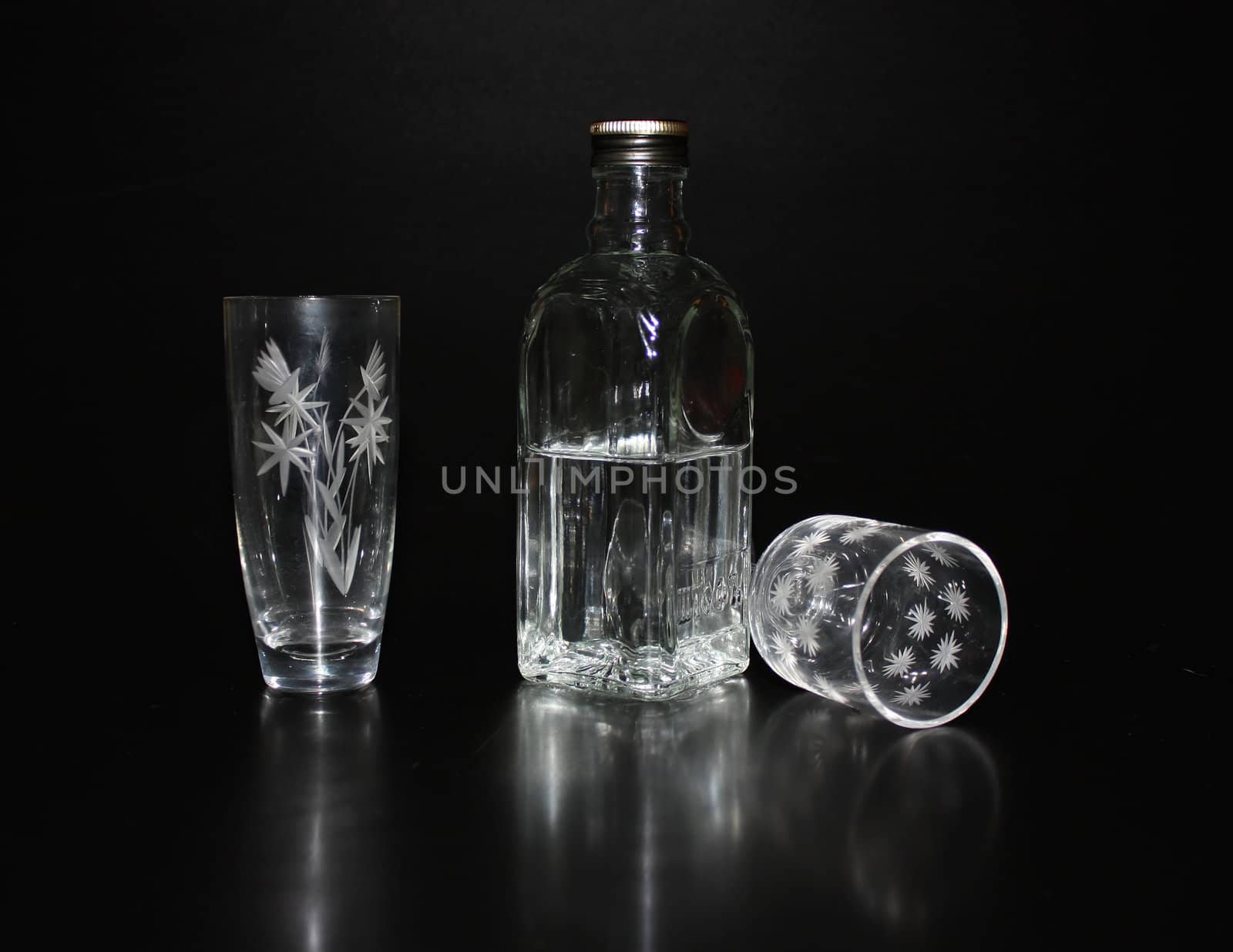 Cut-glass ware and  bottle with vodka by sergpet