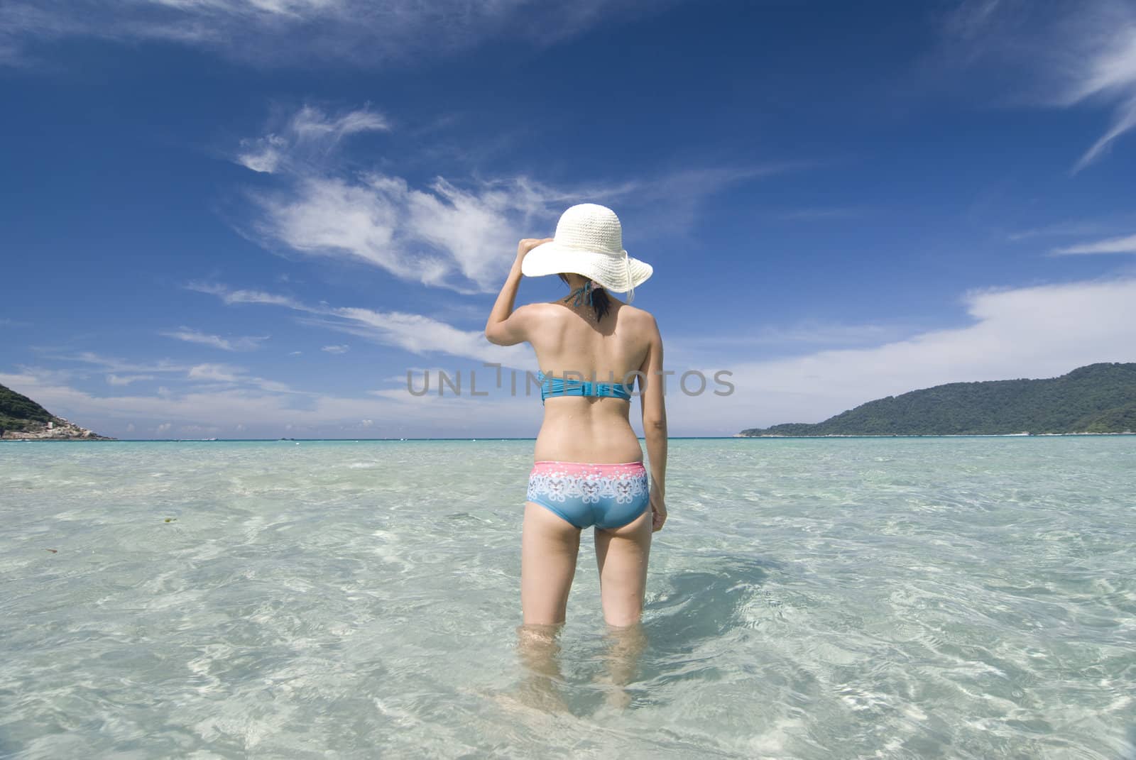 asian with bikini on the beach