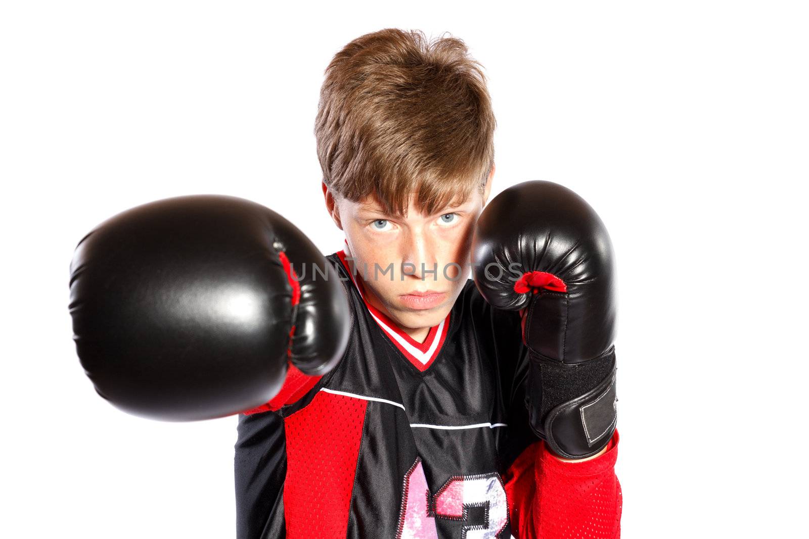 young kickboxer on white background, focus on face