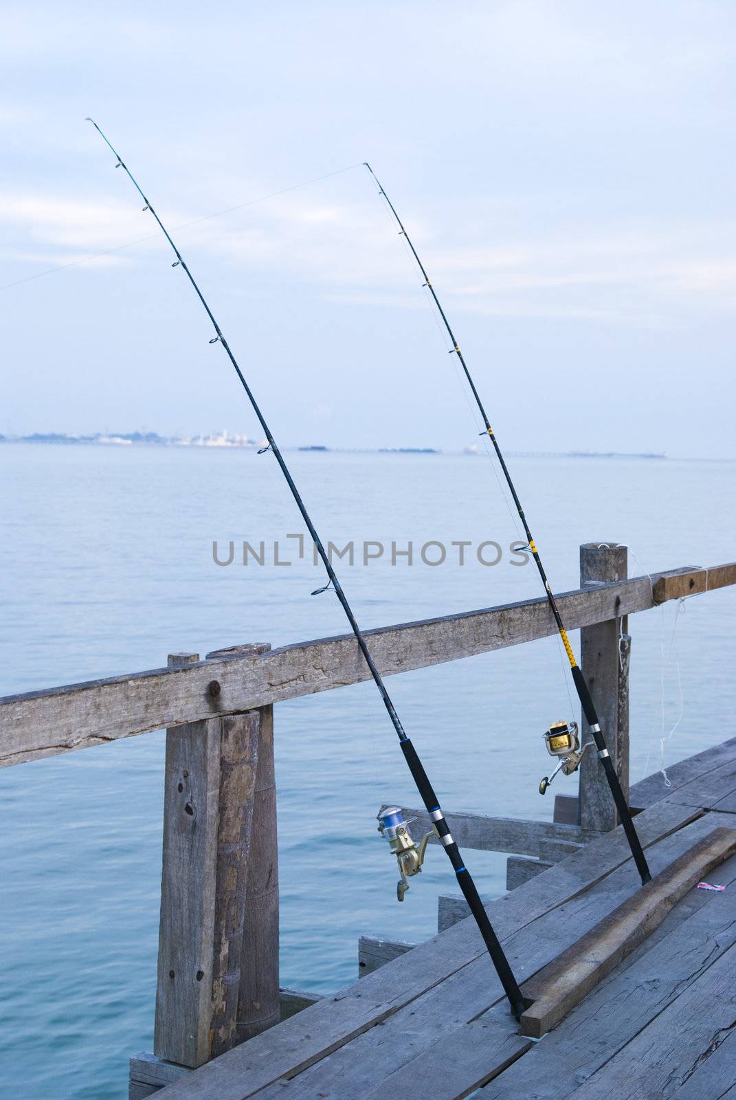 fishing rods during dusk