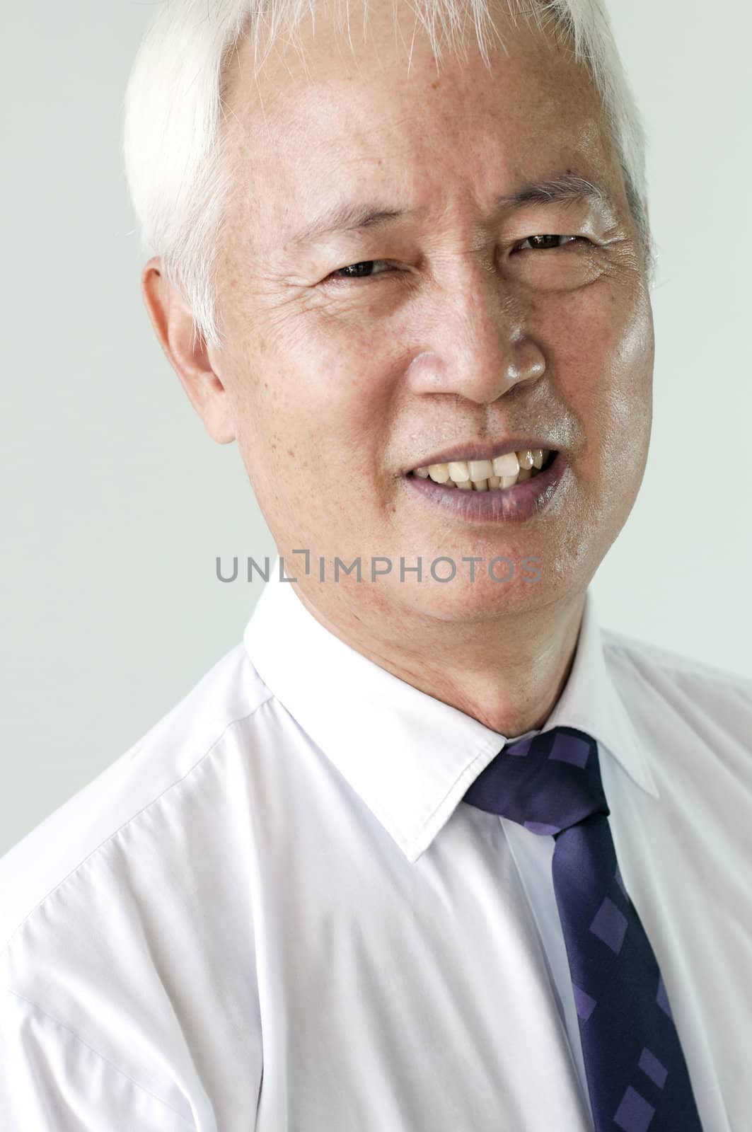 senior asian business man by yuliang11