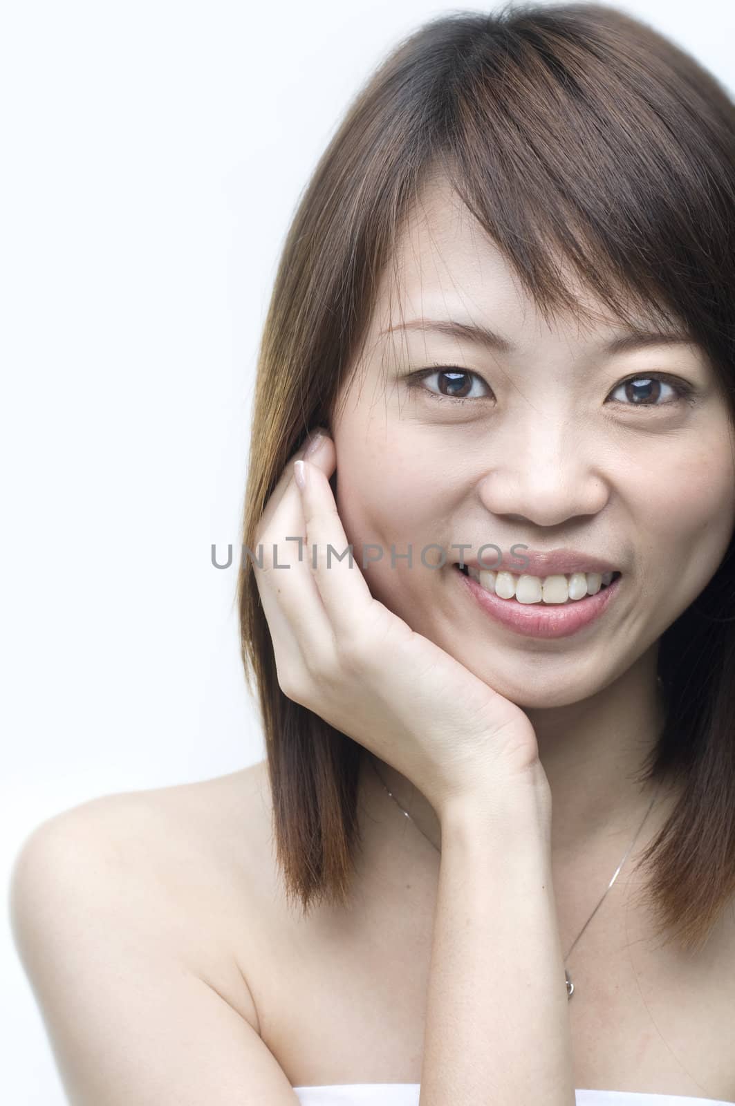 close up shot of a smiling asian girl