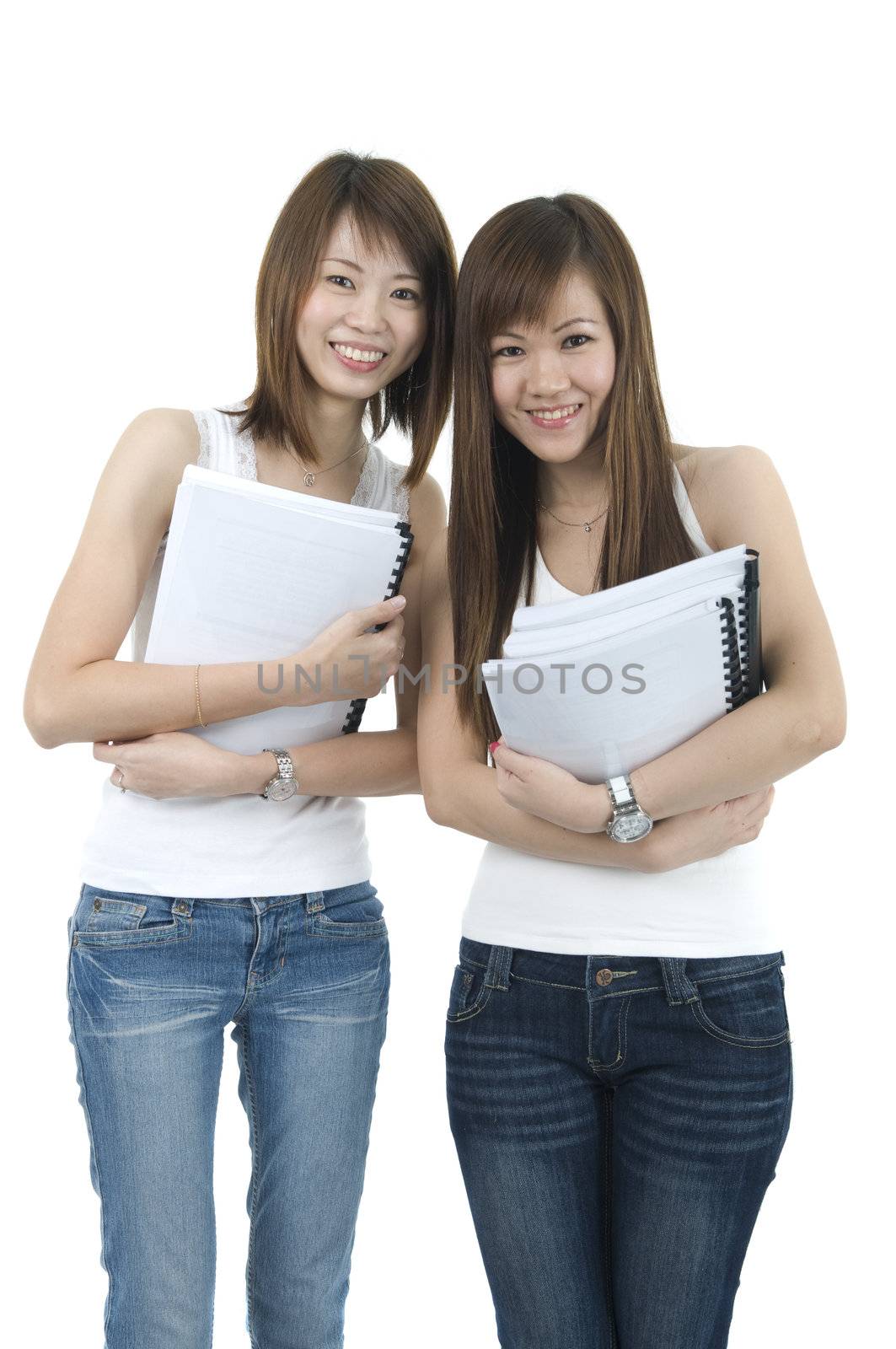 asian college student friends holding book with isolated white background
