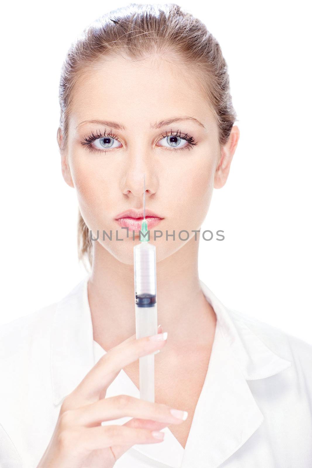 Handsome female nurse holding syringe
