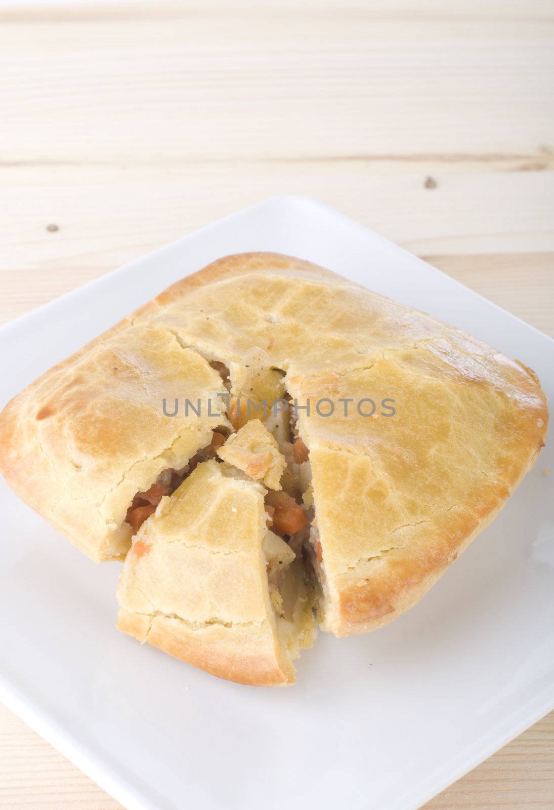 meat pie with wooden natural background
