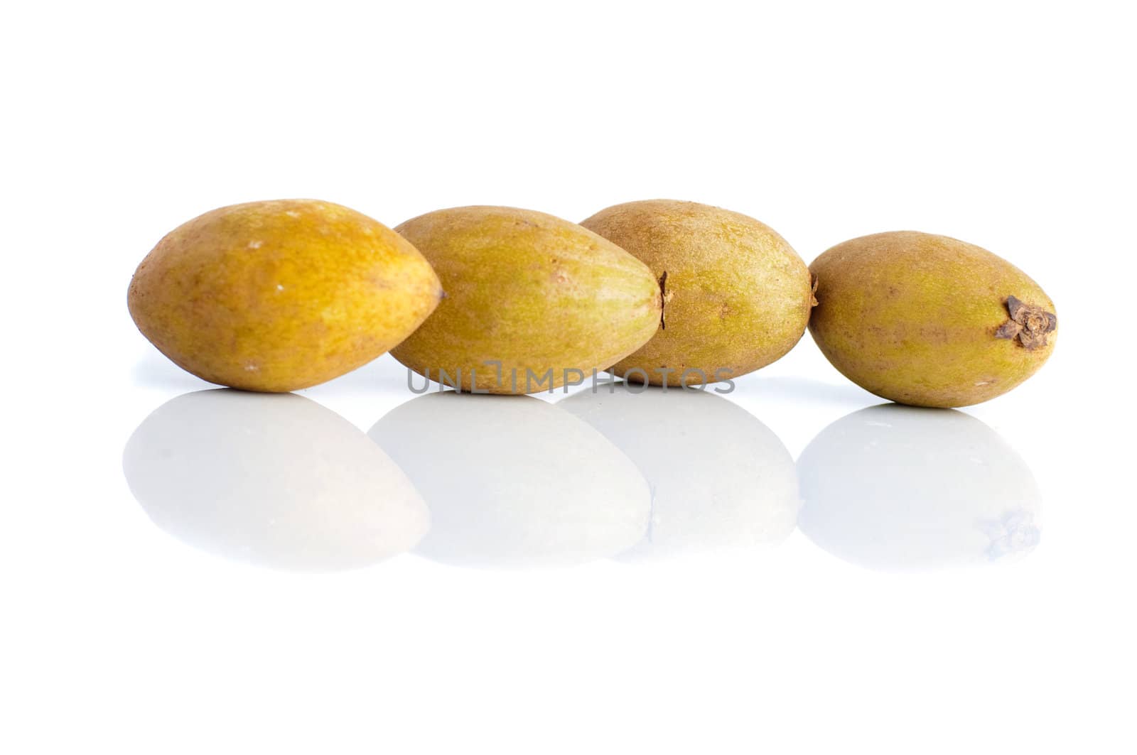 Tropical fruit - Chiku isolated on white background.
