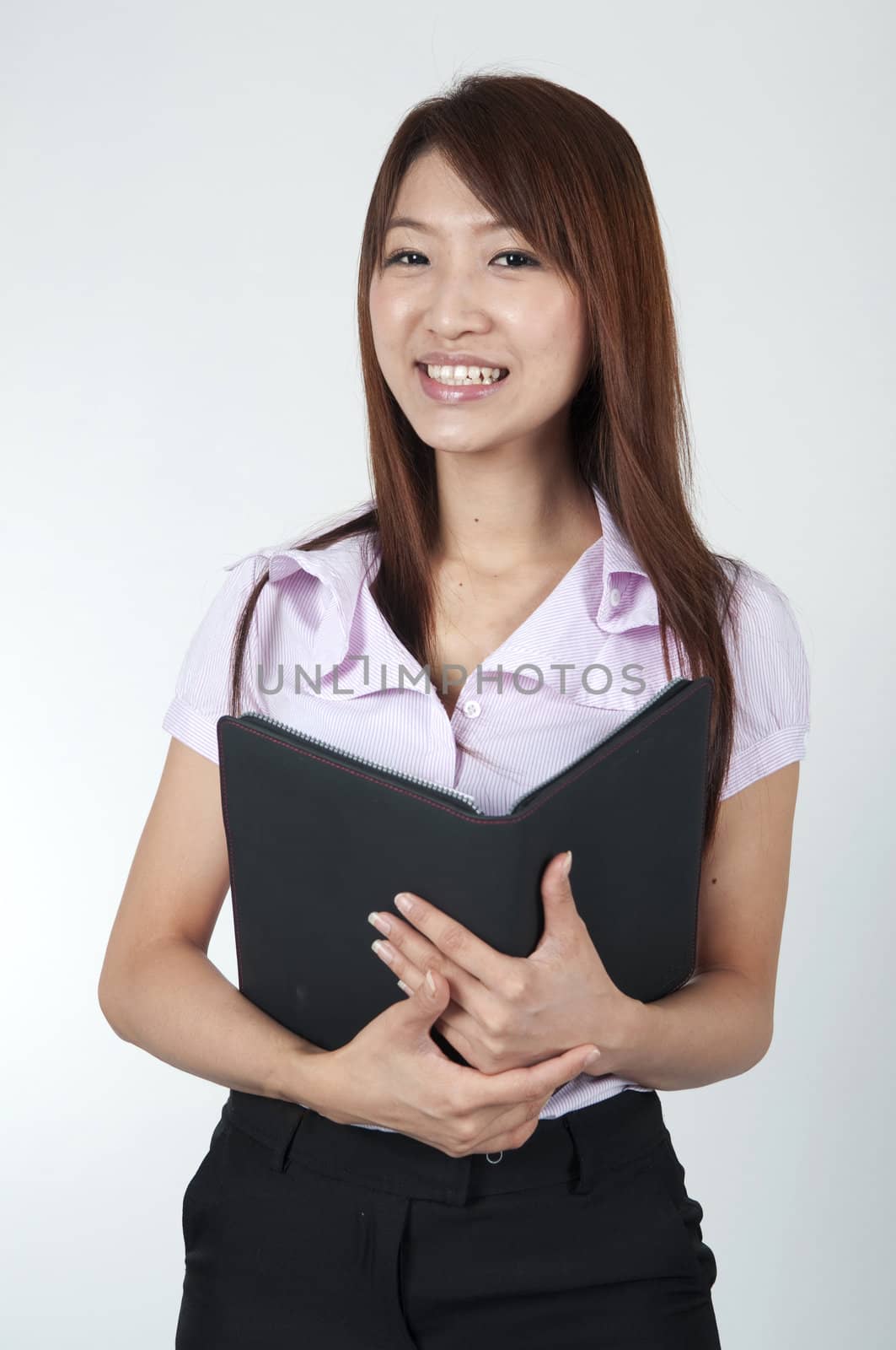 asian business women holding a folder