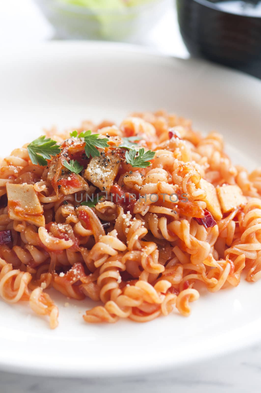 close up shot of tomato pasta  by yuliang11
