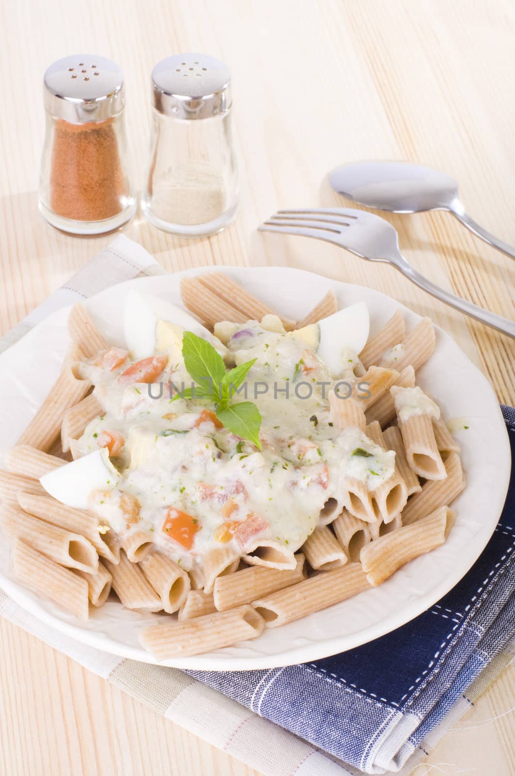 Spaghetti carbonara pasta on wooden background
