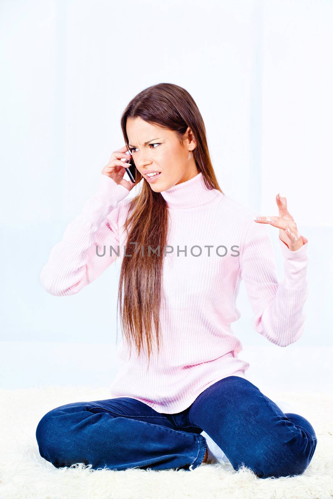 angry woman on phone by imarin