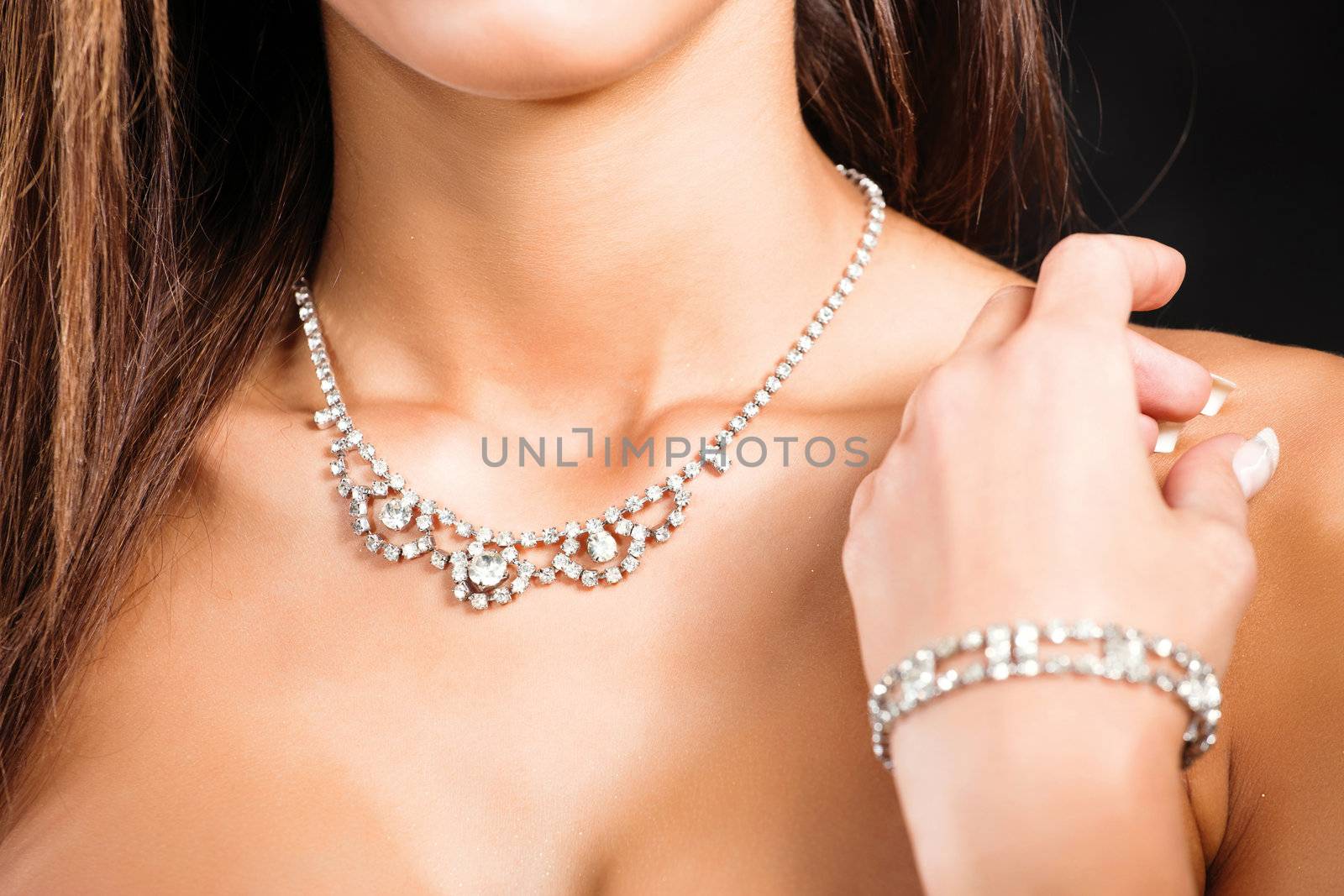 necklace on woman's neck by imarin