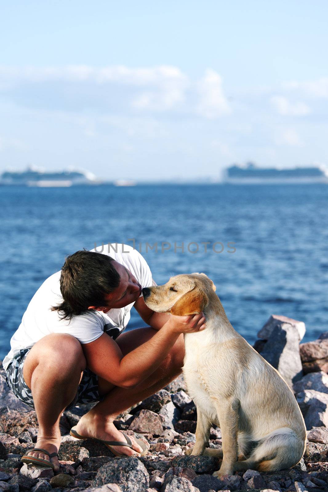 man and dog blue sky on background