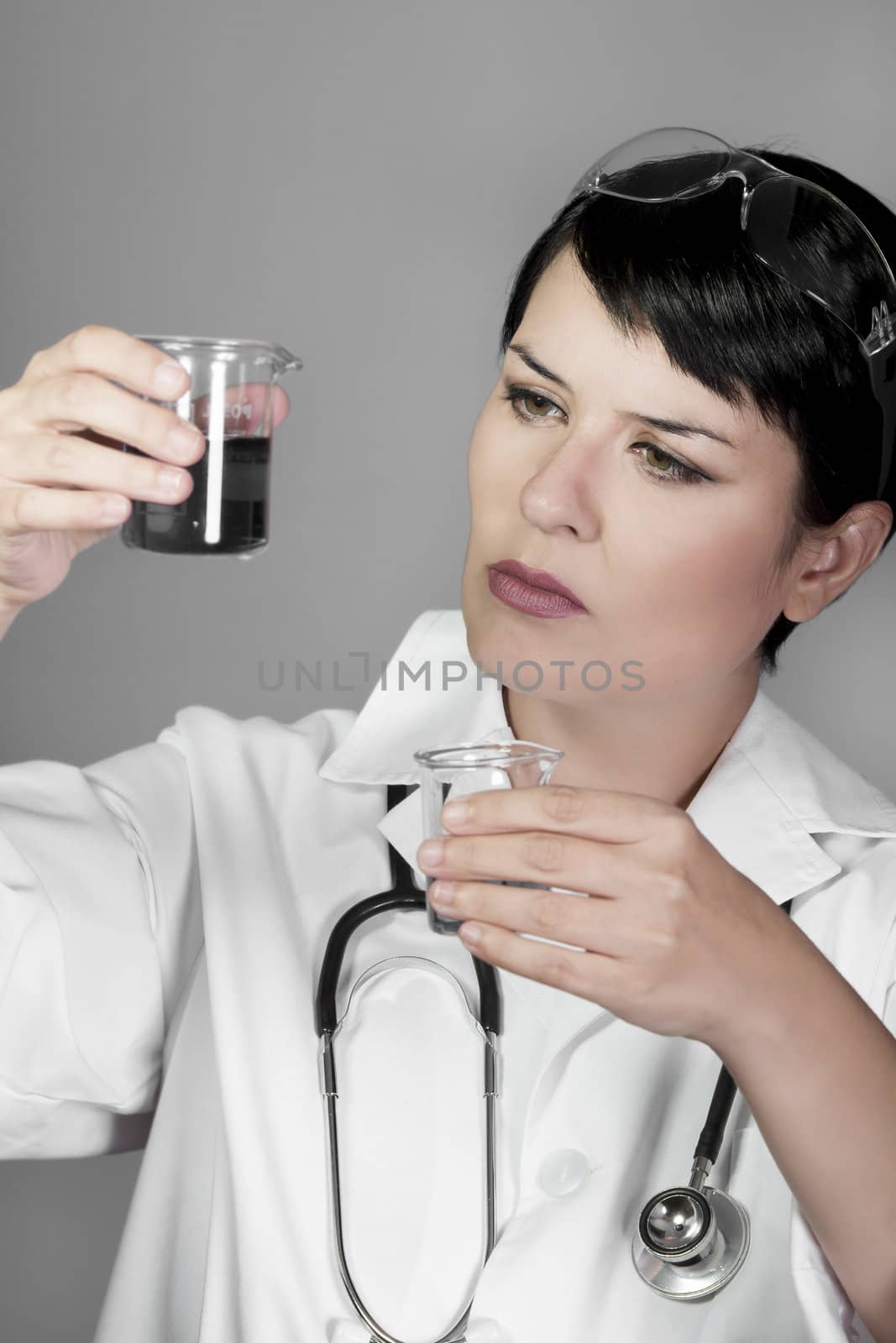 brunette female doctor checking laboratory samples, successful career women